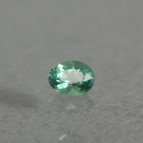 蛍光グリーンアウイナイト 0.084ct 鑑別書UVペン付