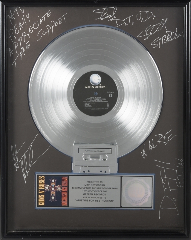 GUNS N' ROSES SIGNED PLATINUM RECORD AWARD •