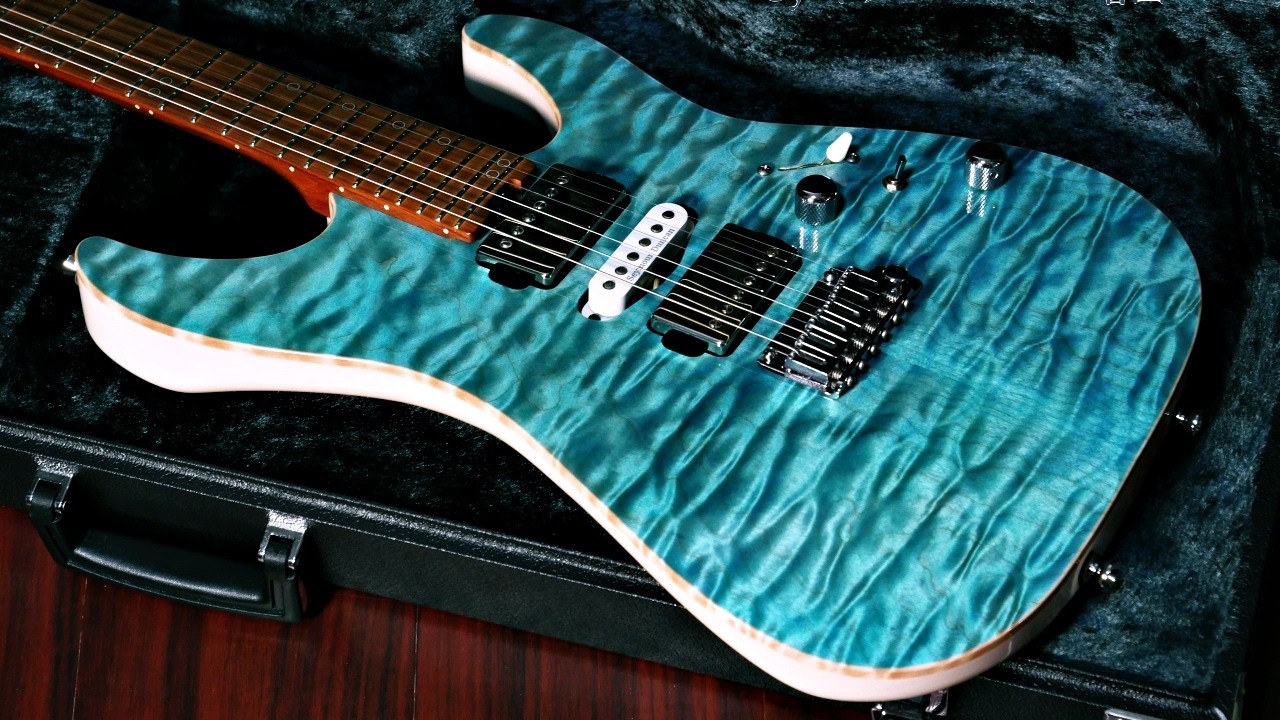 A high-end shop order with a AAAAA quilted maple neck! Schecter