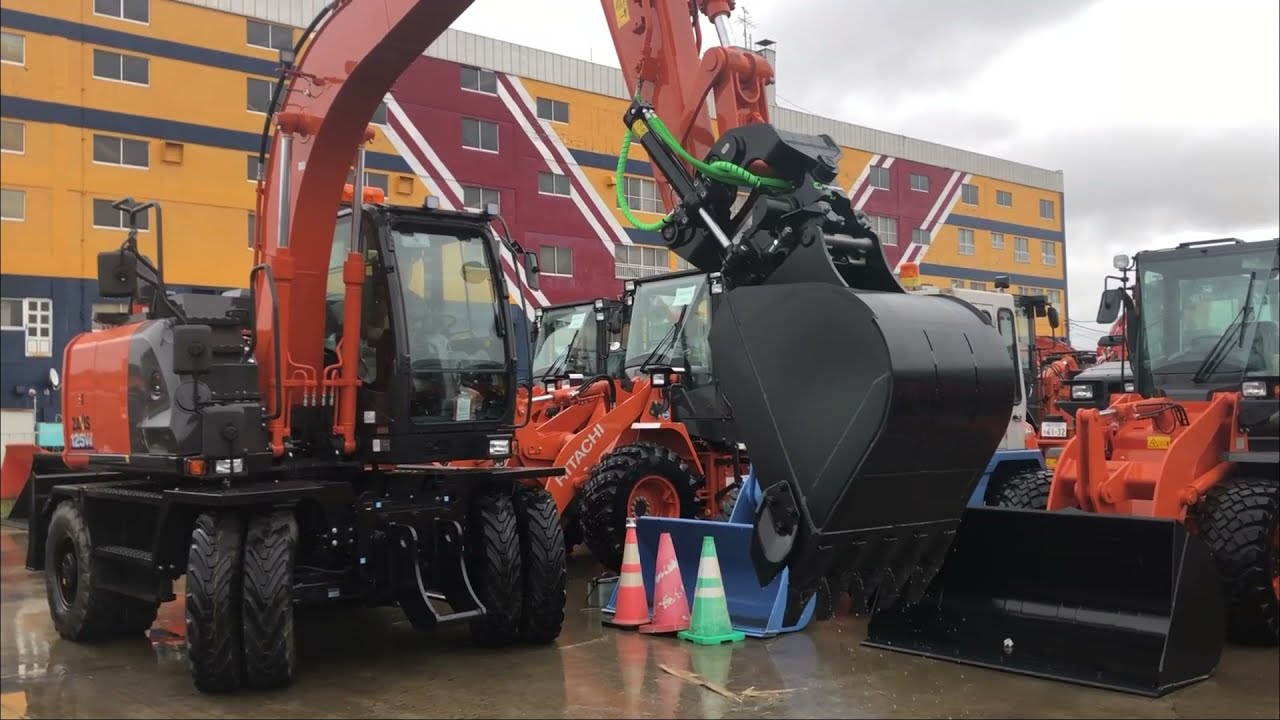 タイヤ式油圧ショベルZX125W-6にチルトローテーターX18取り付け｜建設