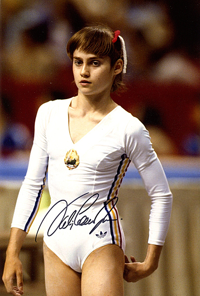 体操選手 ナディア・コマネチ 直筆サイン入り写真 金メダリスト 白い
