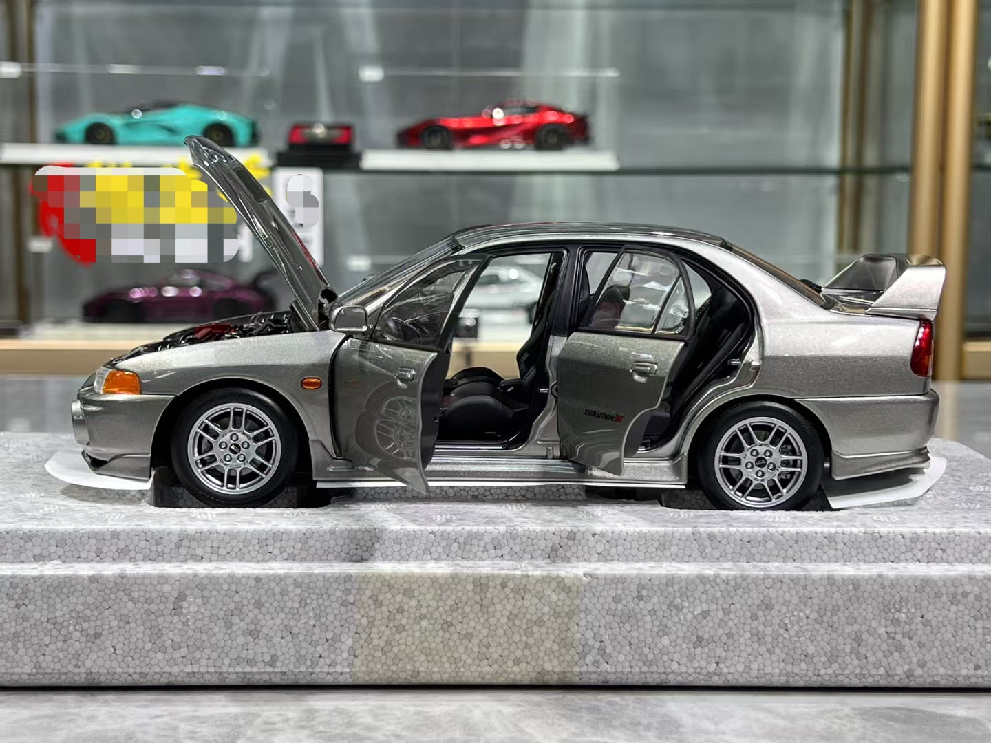 MotorHelix Mitsubishi Lancer EVO IV 1/18 – IronCookie Diecasts