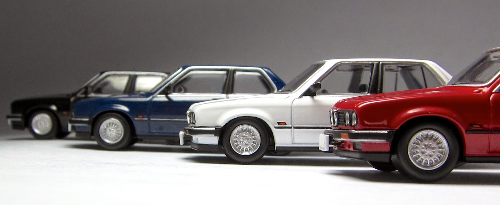 First Look: Tomica Limited Vintage BMW 325i 4-door in both black