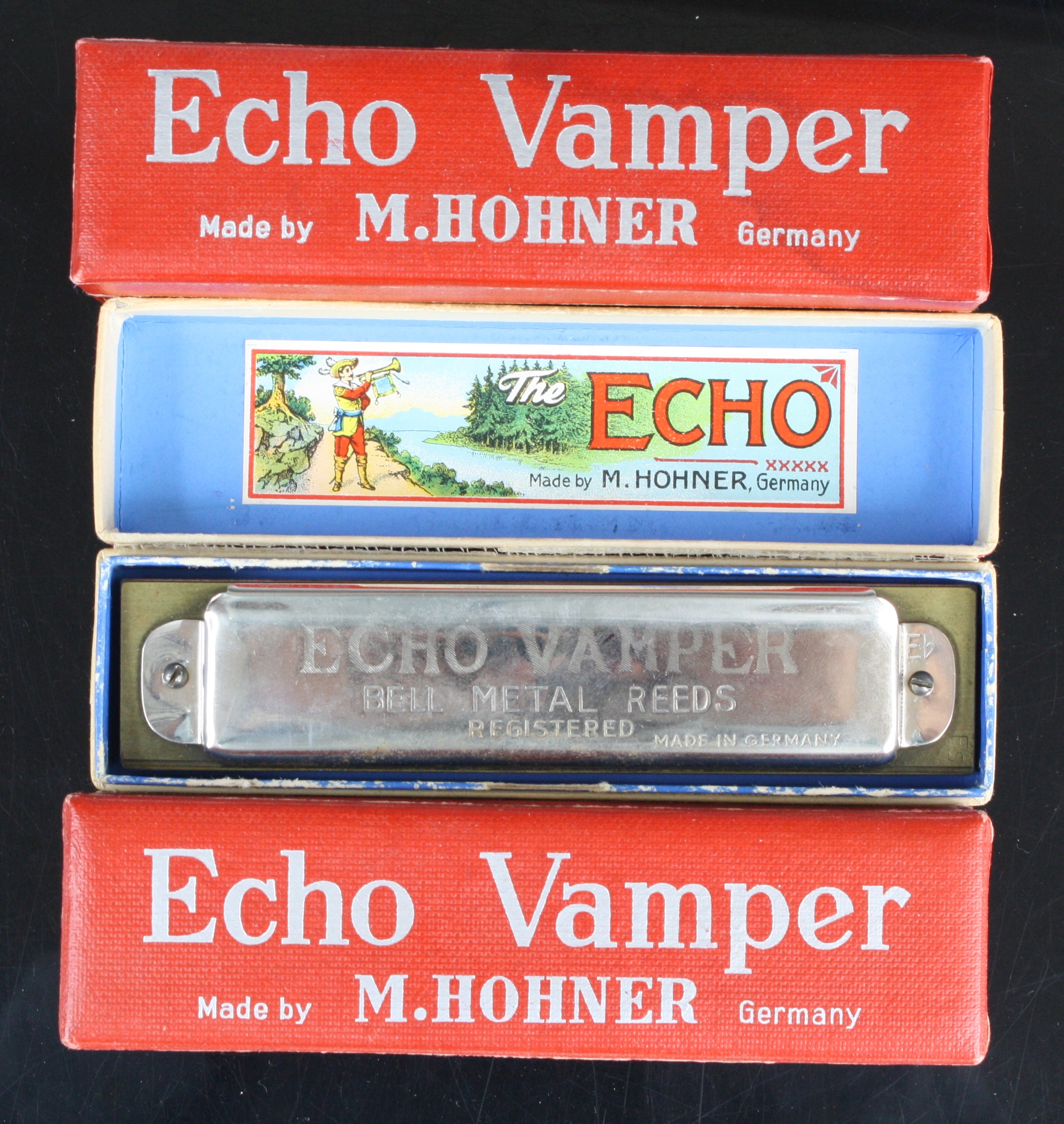 Lot 650 - An M. Hohner The Echo Super Vamper harmonica,