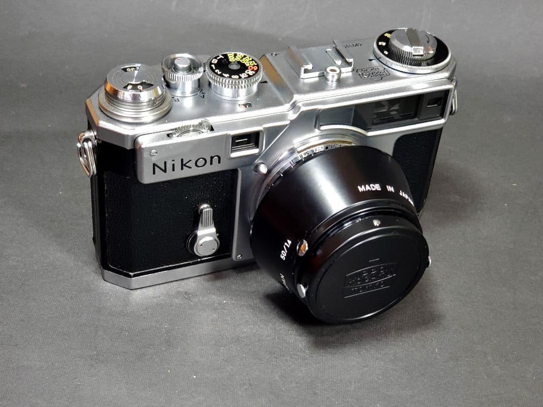 歴史的な価値ニコンSP白ボディー50mm1.4レンズフィルター/新品フード付