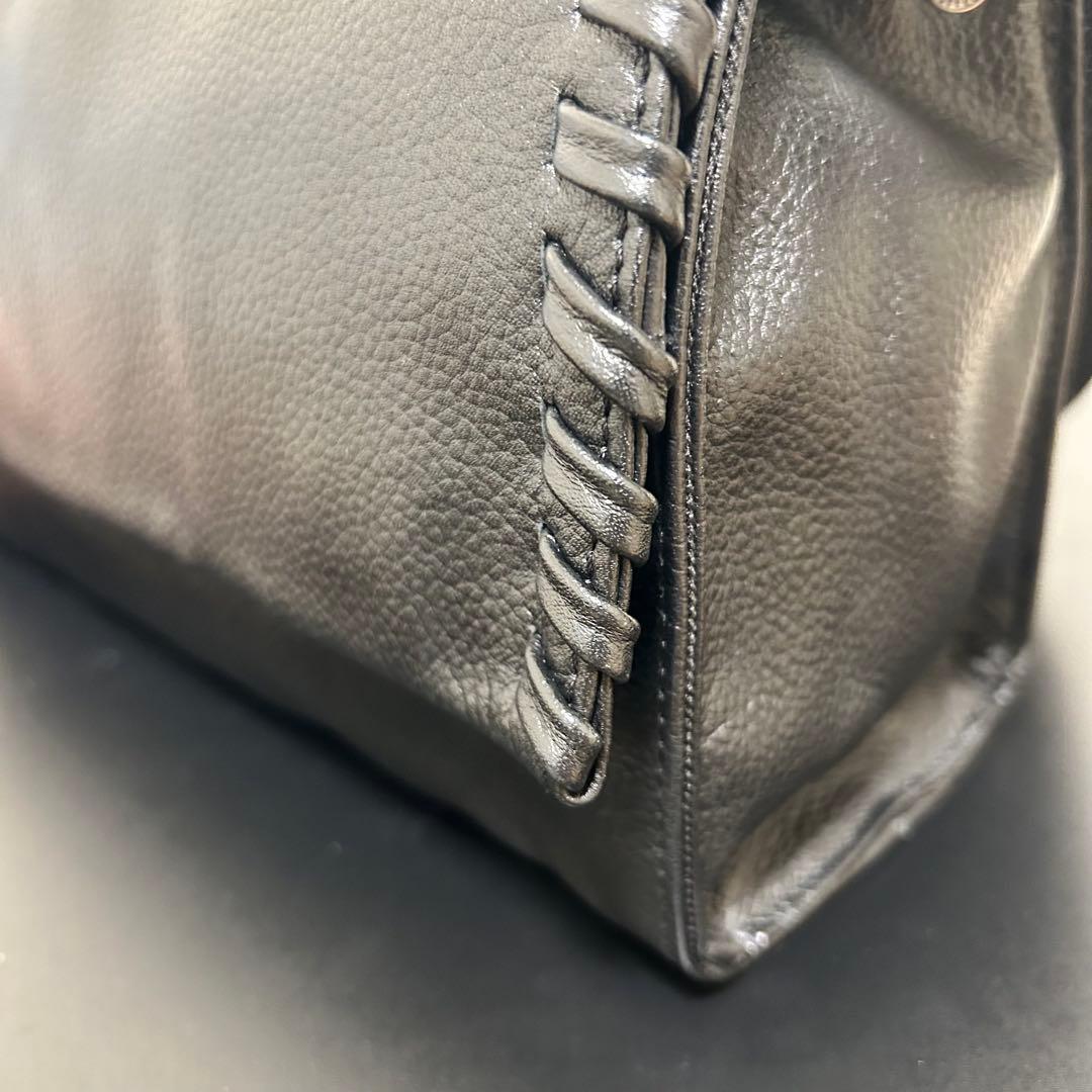 イアパピヨネ　ワイドテープショルダーバッグ　黒 編み込みデザイン