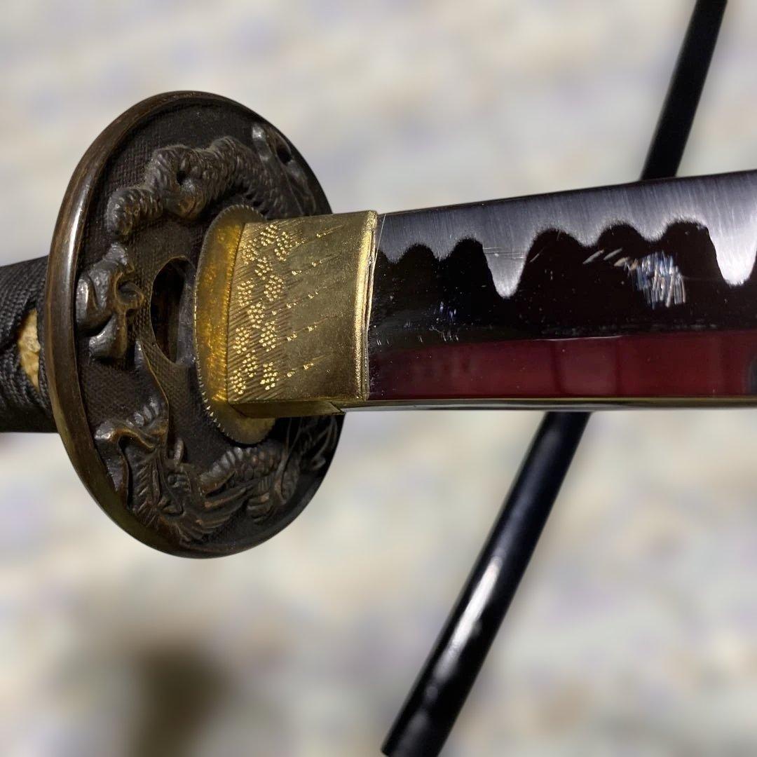 模造刀(小柄付) 黒柄 龍彫楕円鍔 黒呂鞘