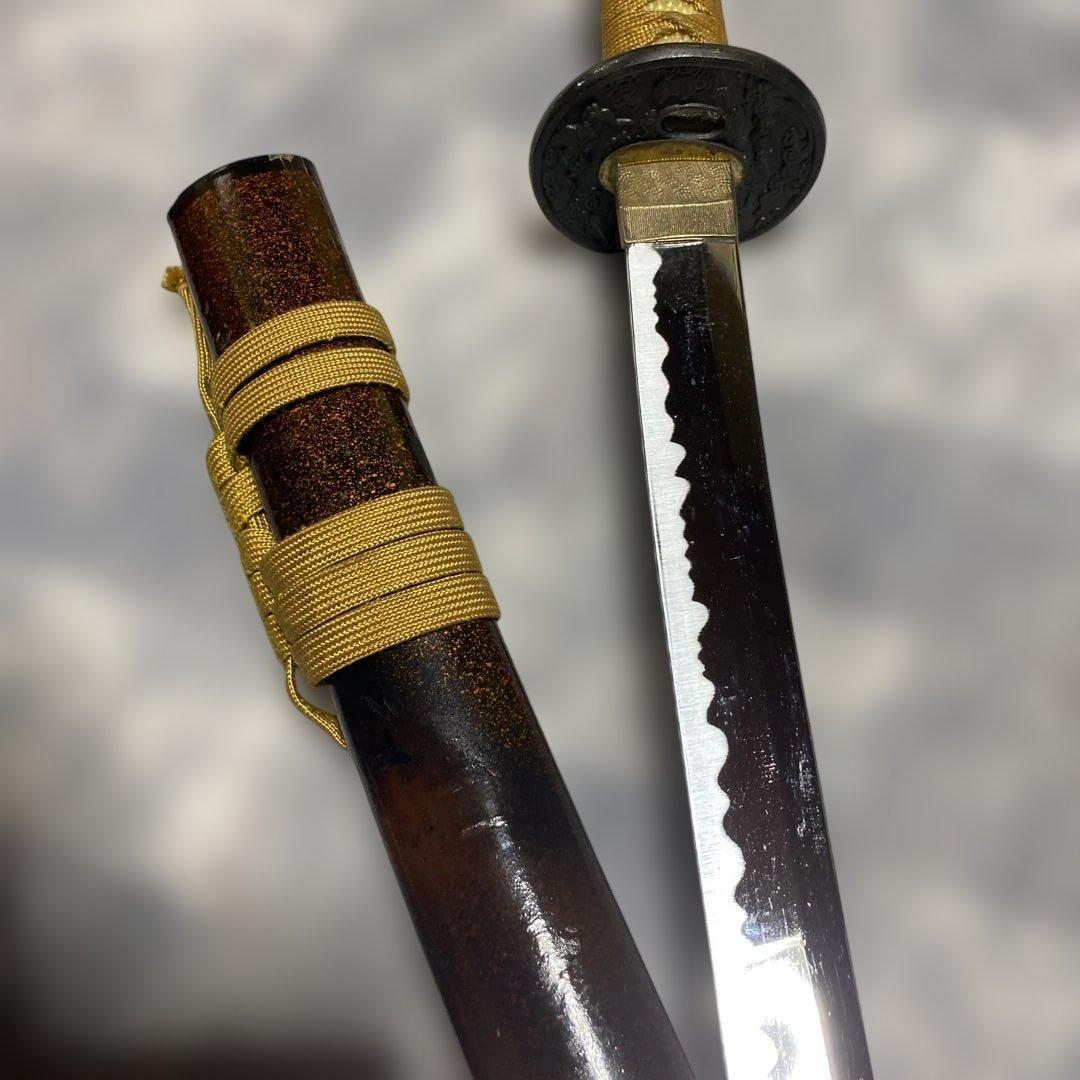 割安模造刀 金茶柄 雲龍楕円鍔 黒粒暈し梨地鞘 - メルカリ