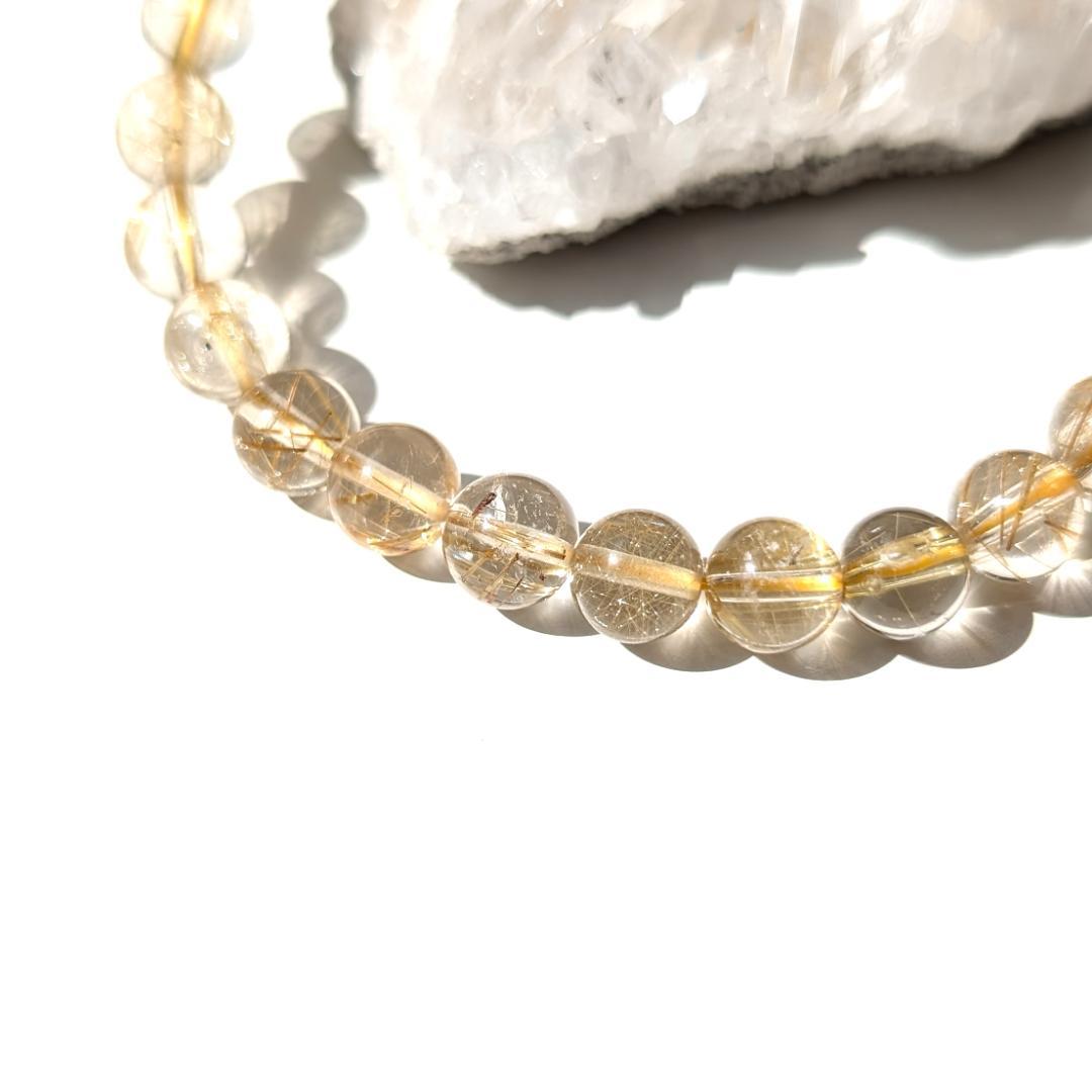 sk　透き通るクォーツと黄金ルチルが美しい 金針水晶ブレスレット 7mm