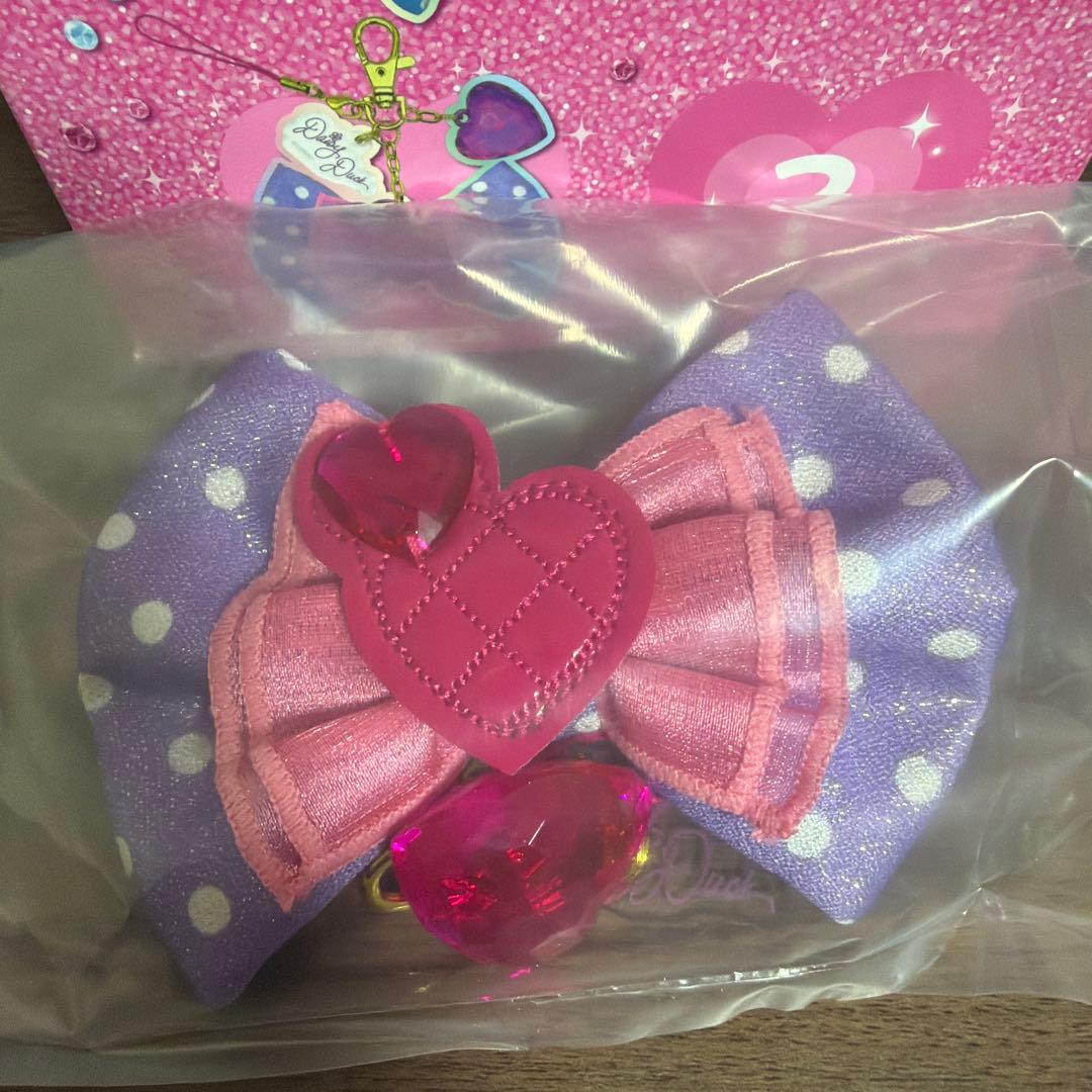 ディズニー パルパルーザ デイジー リボン キーチェーン - メルカリ