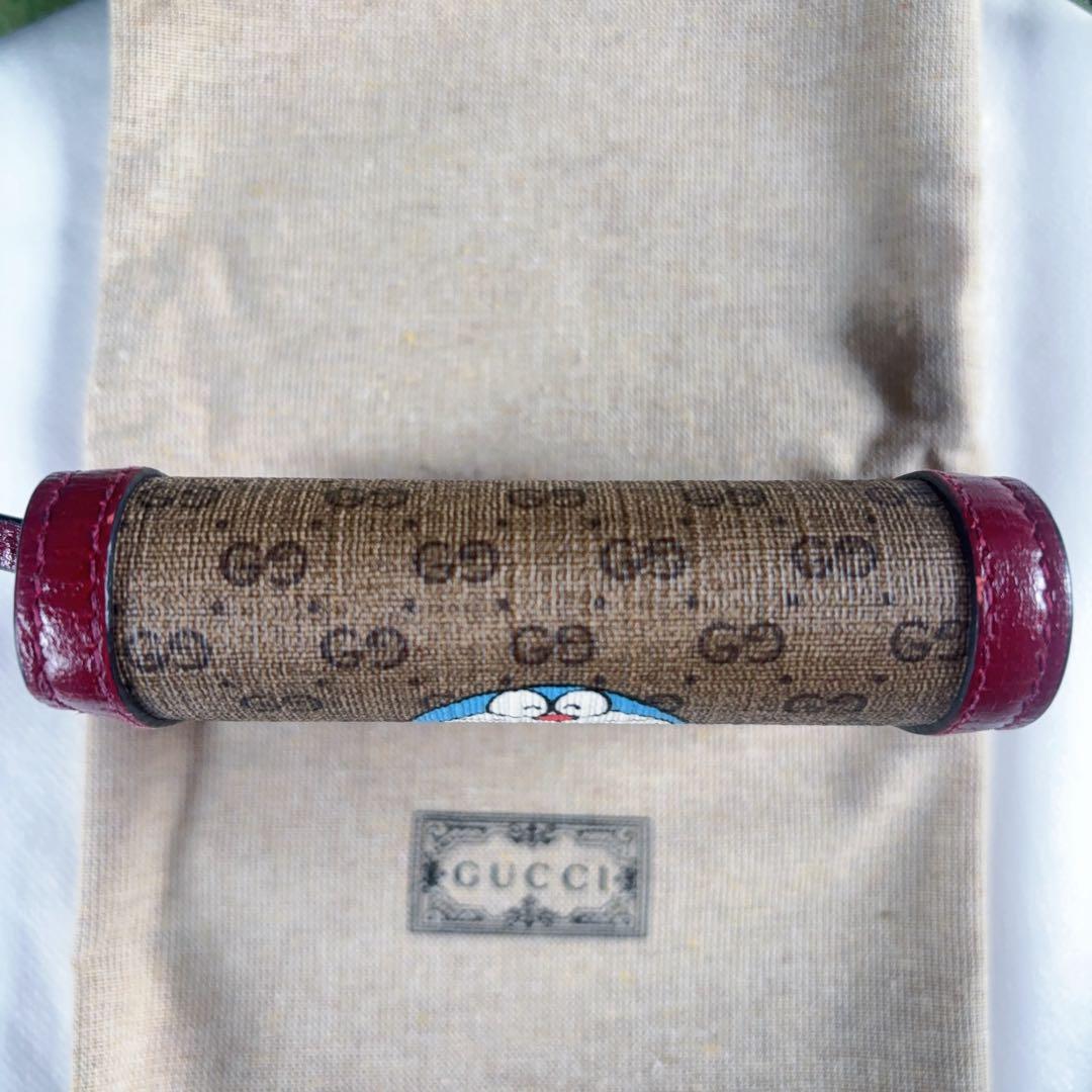 GUCCI ドラえもん 二つ折り財布 レザー GGスプリーム レッド コラボ