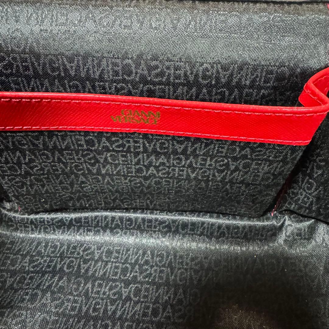 美品 VERSACE レザー バニティバッグ 赤　ファスナー チャーム 太陽