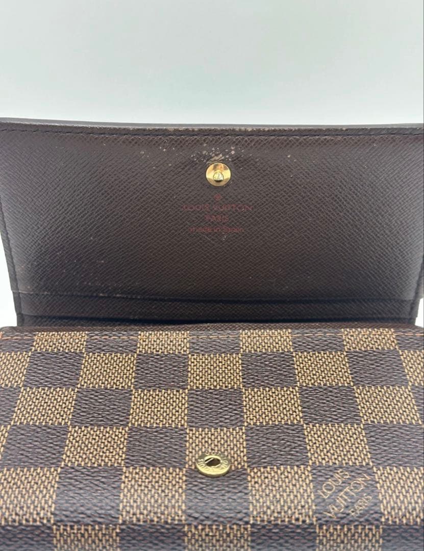 ルイヴィトン ダミエ エベヌ ポルトモネビエ トレゾール 二つ折り財布