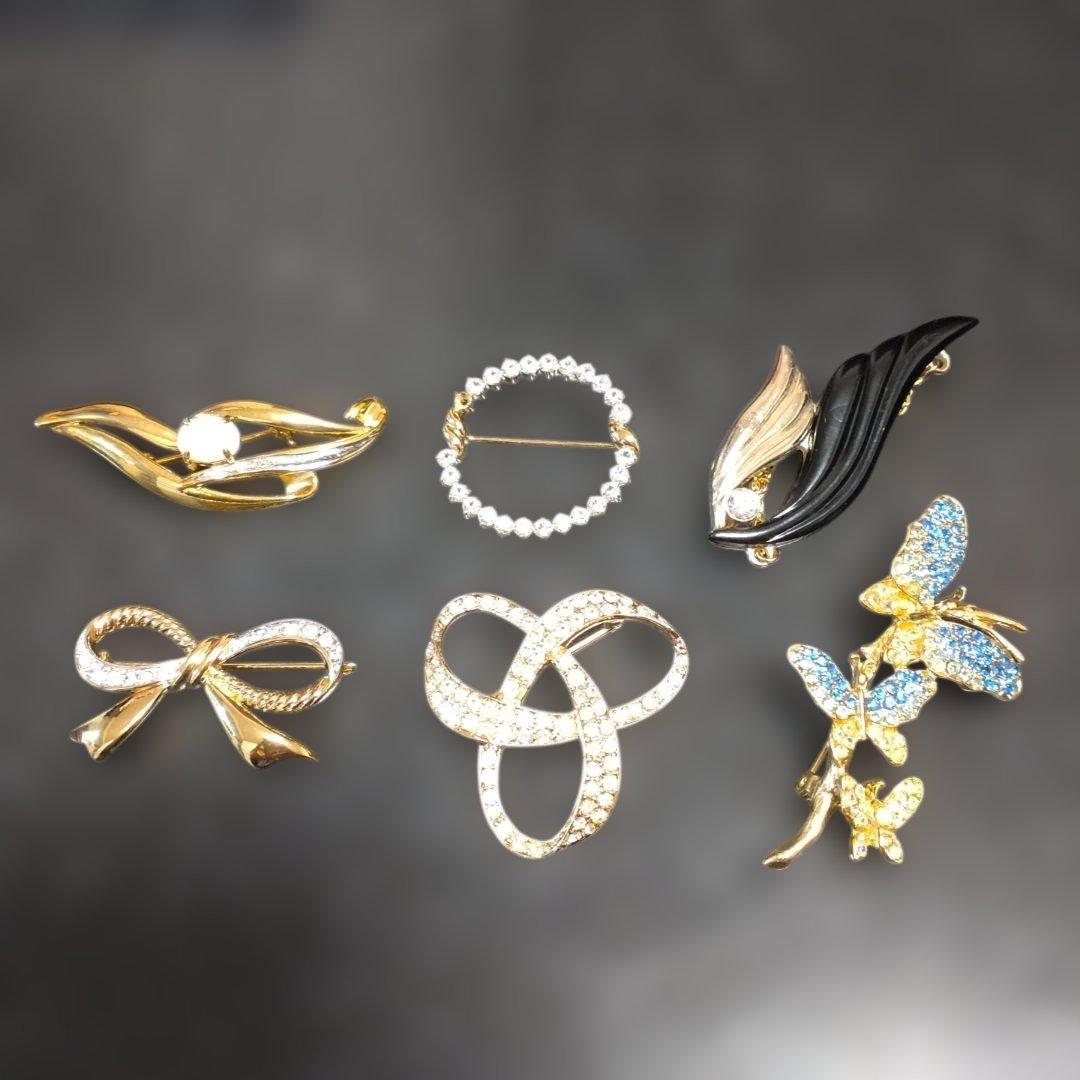 多様なデザインのレトロブローチセット - メルカリ