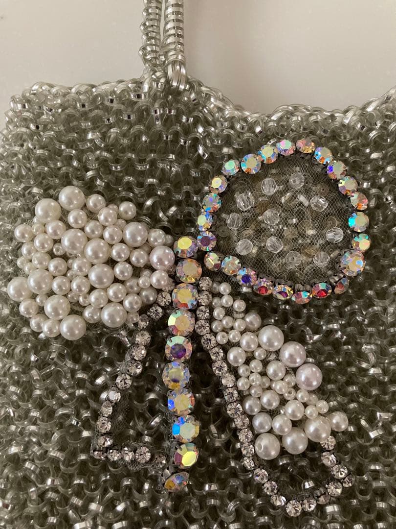 【美品】アンテプリマ　ビーズ装飾リボンモチーフ　ワイヤーバック