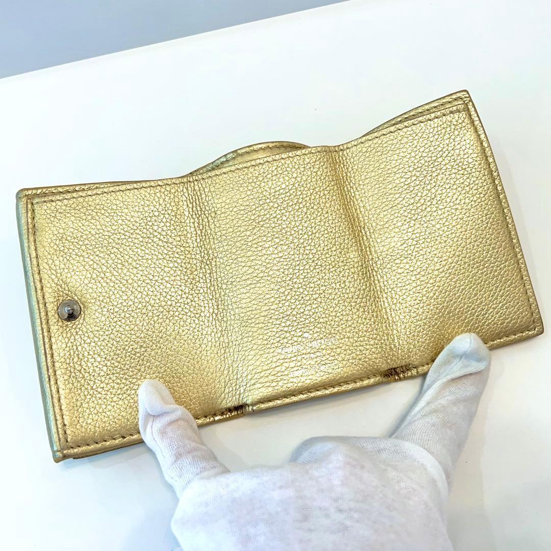 ルイヴィトン ポルトフォイユ ロックミニ 折り財布 ゴールド M69059