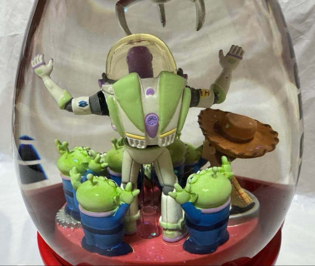 トイストーリー スペースクレーン ライトアップ オルゴール付き スノーグローブ